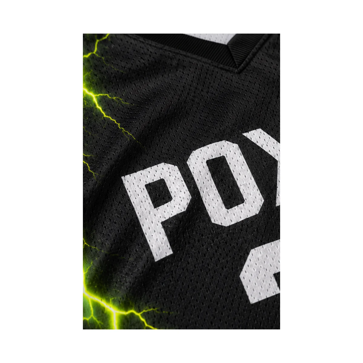 Macro visualization of black perforated basketball jersey mesh fabric