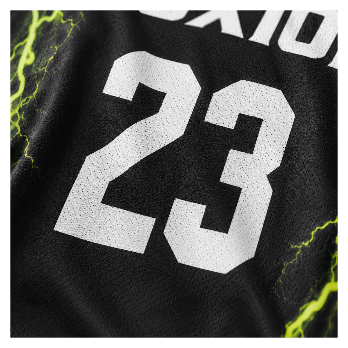Macro visualization of white number 23 on black basketball jersey fabric